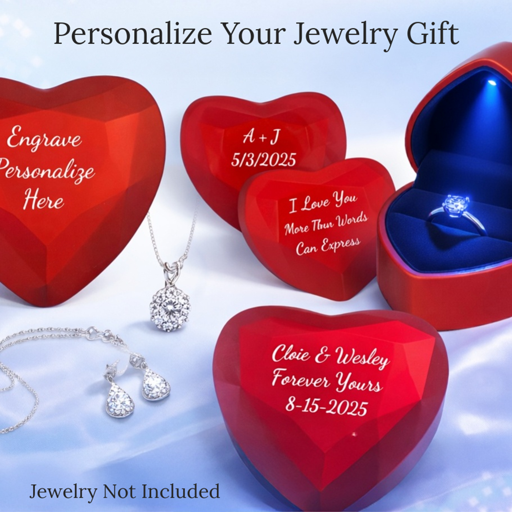 Red heart-shaped jewelry boxes with engraved text on a white background