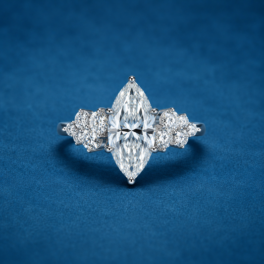 marquise ring on hand ring with a blue background