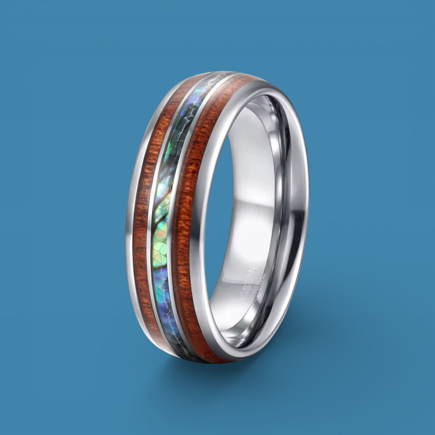 1ct Tungsten ring with wooden and abalone shell inlay on a blue background
