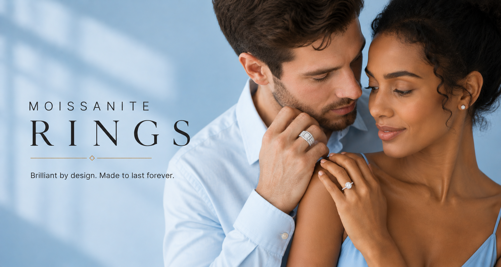 Couple wearing moissanite rings with a light blue background